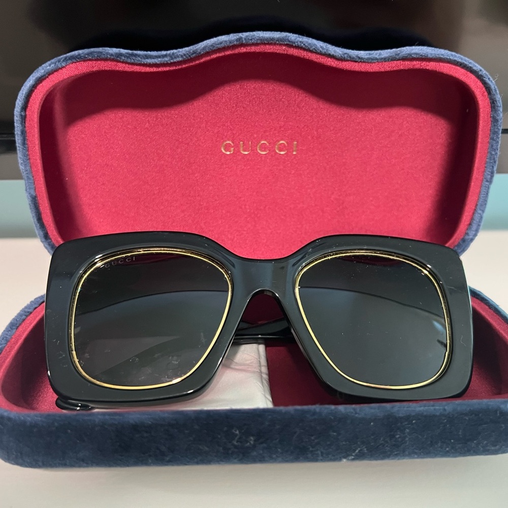 Gucci Black Sunglasses with Gold Detailing